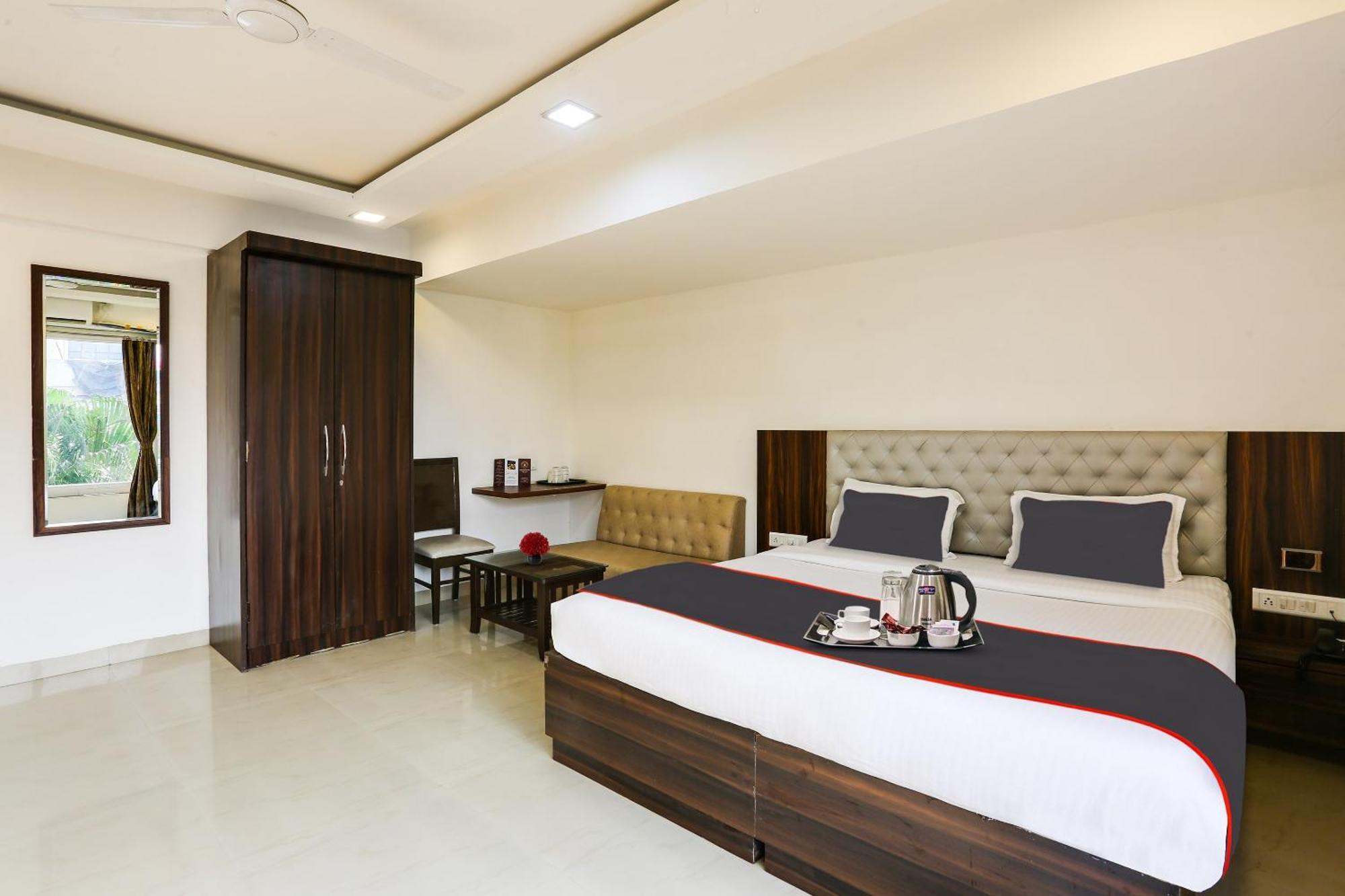 Capital O Arsh Executive Inn Мумбаи Экстерьер фото